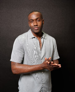 Shomari Love Smirking at the Camera