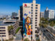 Artist Brian Peterson Paints the Tallest Mural for the Long Beach Walls x Art Renzei Project