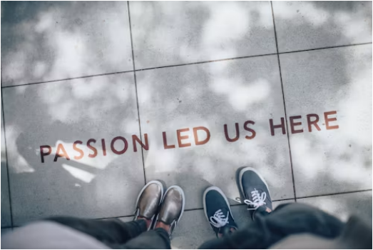 Passion Led Us Here written on a pathway